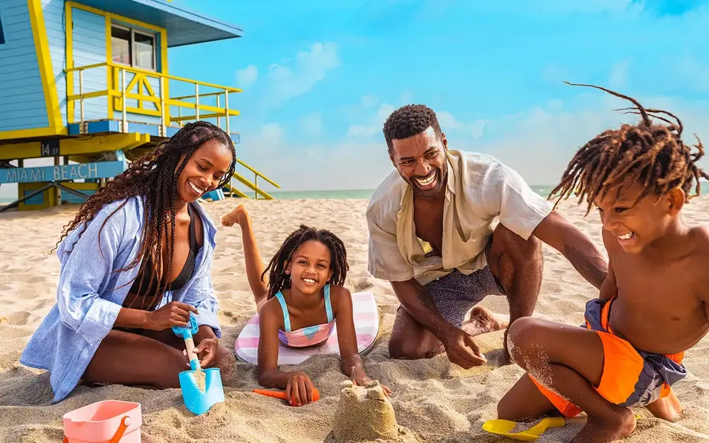 Family on the sands of Miami Beach