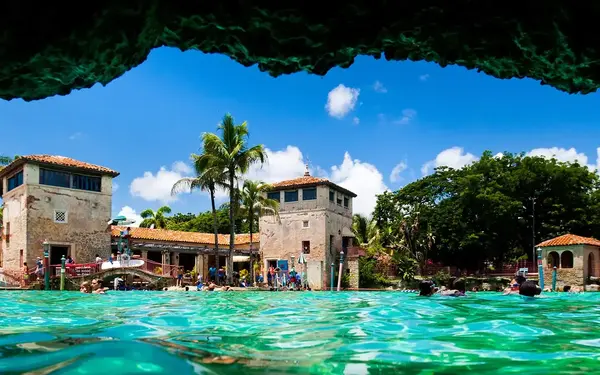 Swim through the cave at Venetian Pool in Coral Gables