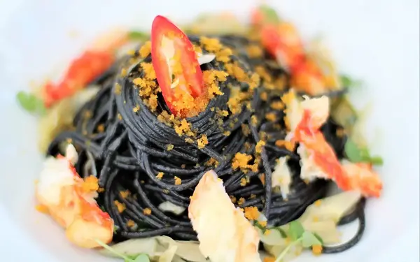 Black spaghetti al nero at Amare