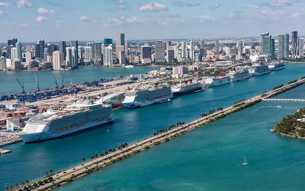 Aerial view of cruise ships at PortMiami, causeway and skyline