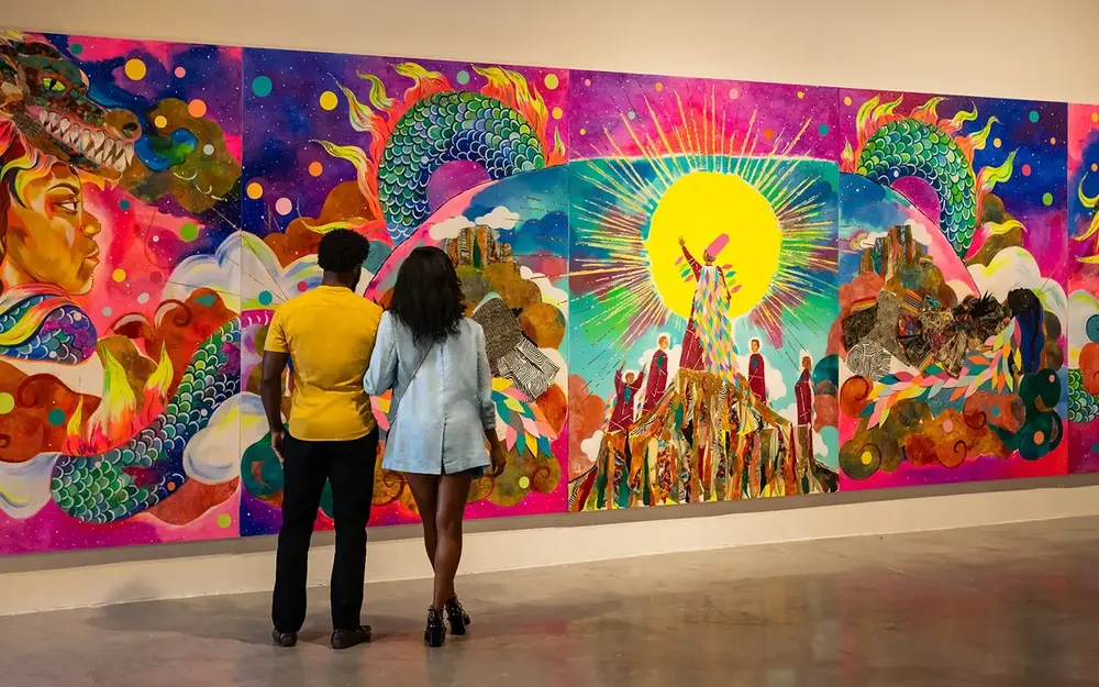 Couple enjoying a colorful mural